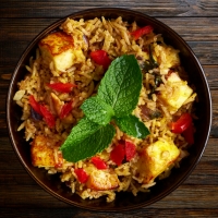 Indische Biryani mit gegrilltem Paneer und Gewürzreis – serviert bei India4U Bern
